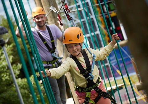 two kids on high rope course