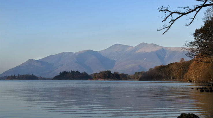 a view of Skiddaw from across a lake
