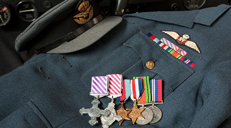 A Second World War RAF uniform laid out with medals