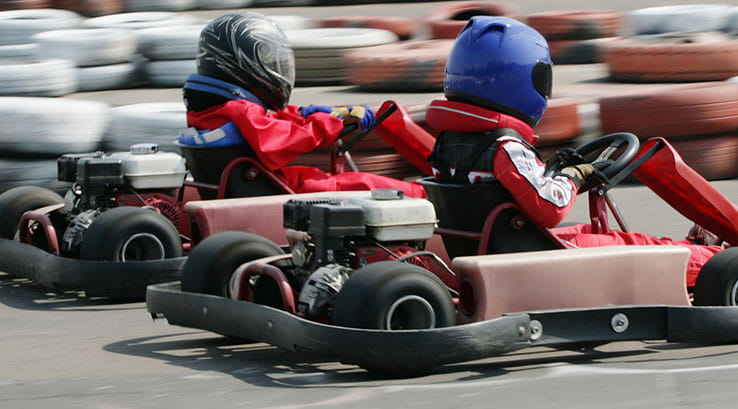 Kids karting on a race track