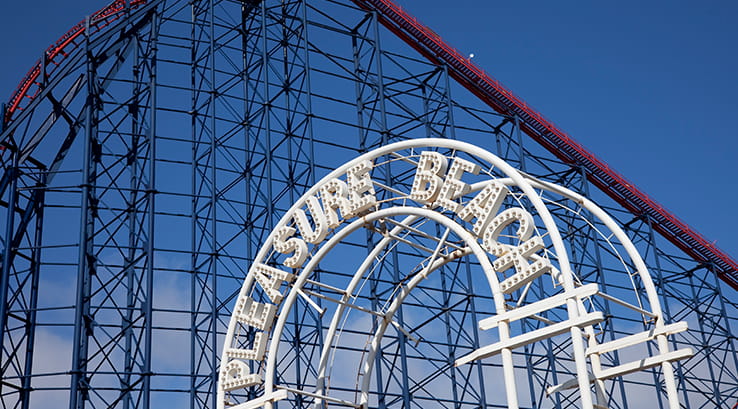 The Blackpool Pleasure Beach sign with the Big One rollercoaster in the background