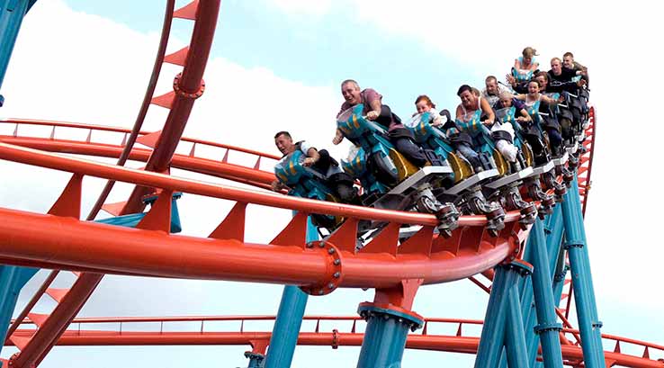 People riding a roller coaster at Flamingo Land