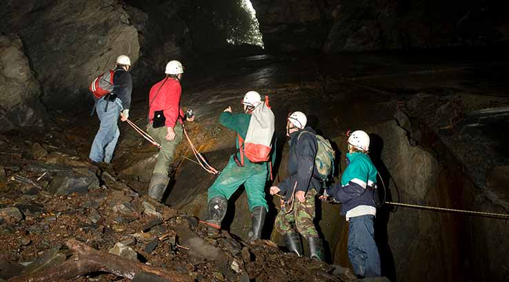 A group walking through the mines