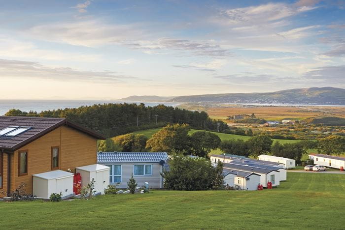 An elevated view of Brynowen Holiday Park and the surrounding countryside and coastline