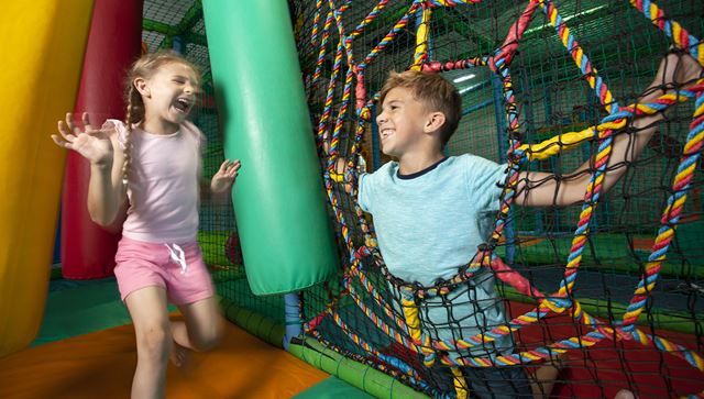 Two children playing in the soft play area at Challaborough Bay Holiday Park