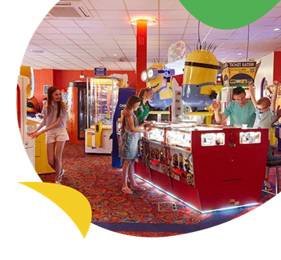 Family enjoy amusement arcade at Cherry Tree Holiday Park