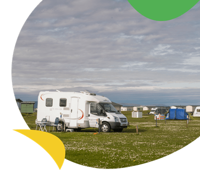 Touring and camping field looking out to sea at Grannie's Heilan Hame Holiday Park