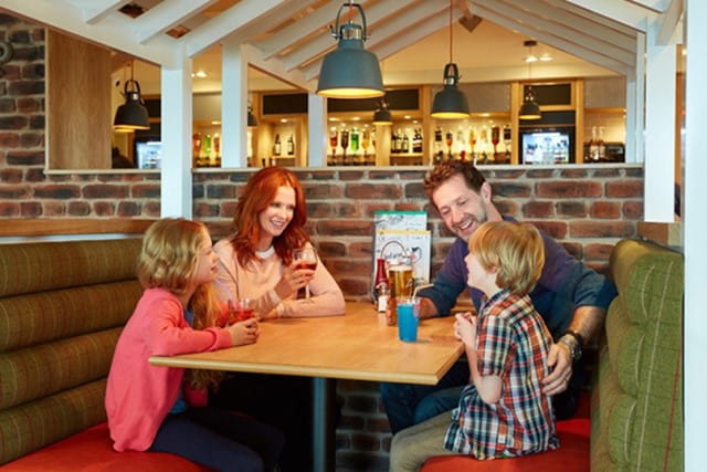 family enjoying a meal in the restaurant