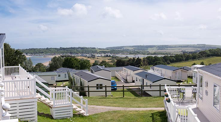 A view overlooking the caravans at Nodes Point Holiday Park