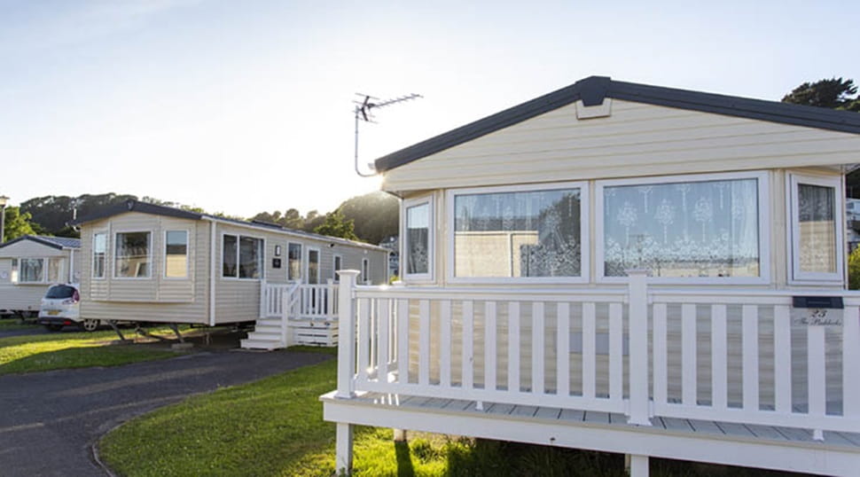 Caravans with verandas at Pendine Sands Holiday Park