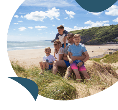 Family on the beach at Pendine Sands Holiday Park