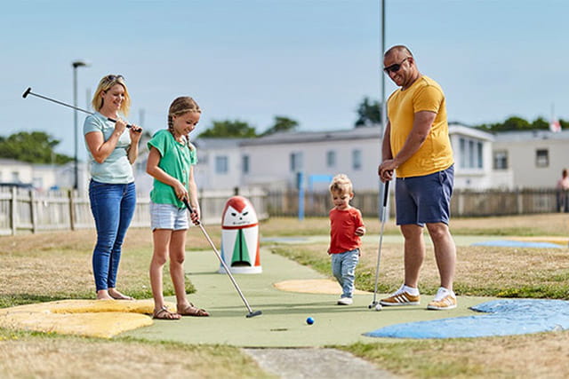 A family game of crazy golf at Romney Sands