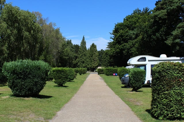 A picturesque touring site at Sandford Holiday Park