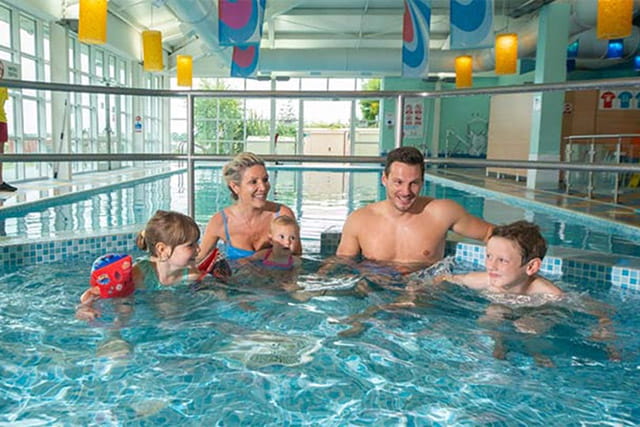 Families playing in the indoor swimming pool at Withernsea Sands Holiday Park