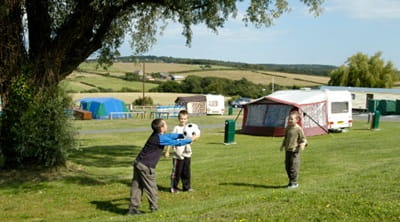 People Playing ball games on the campsite