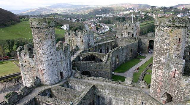 An aerial view of the ancient ruins of Conwy Castle in Wales