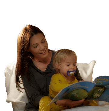 mother and baby reading bed time story