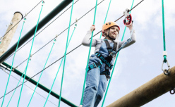 Girl climbing on ropes